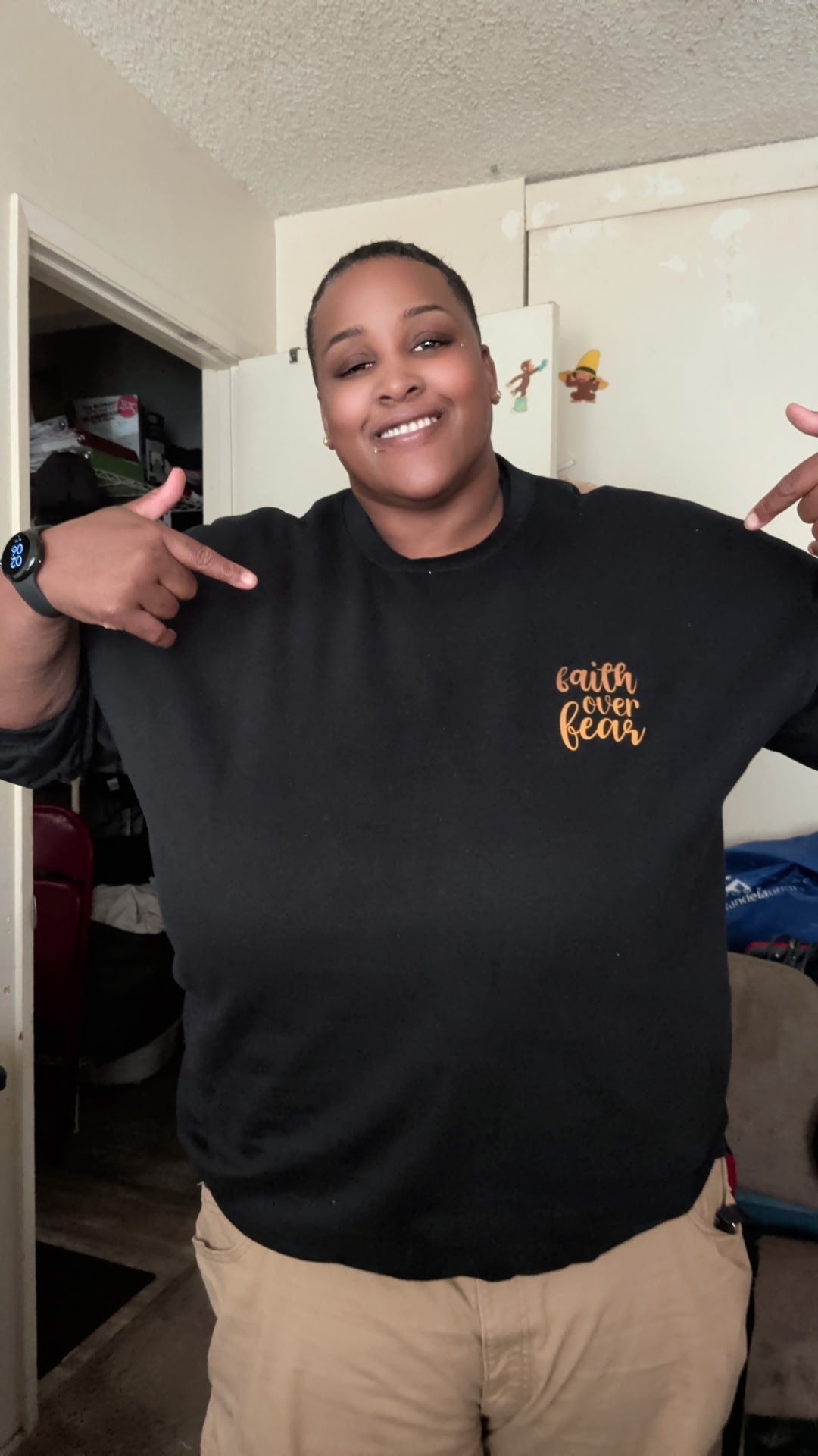 Model Faith over fear sweater